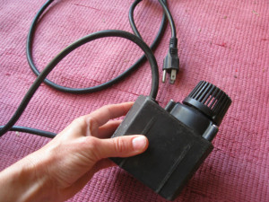 A small fountain pump is a great garden helper