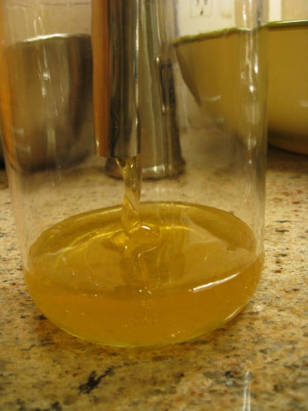 fresh honey being screened